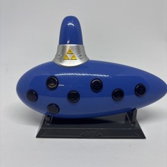 THINKGEEK Legend Of Zelda: Ocarina Of Time Electronic Ocarina W/ Stand & Book