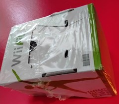 2008 WiiFit Launch Promo Booklet with DVD, loosely sealed with dispenser box.