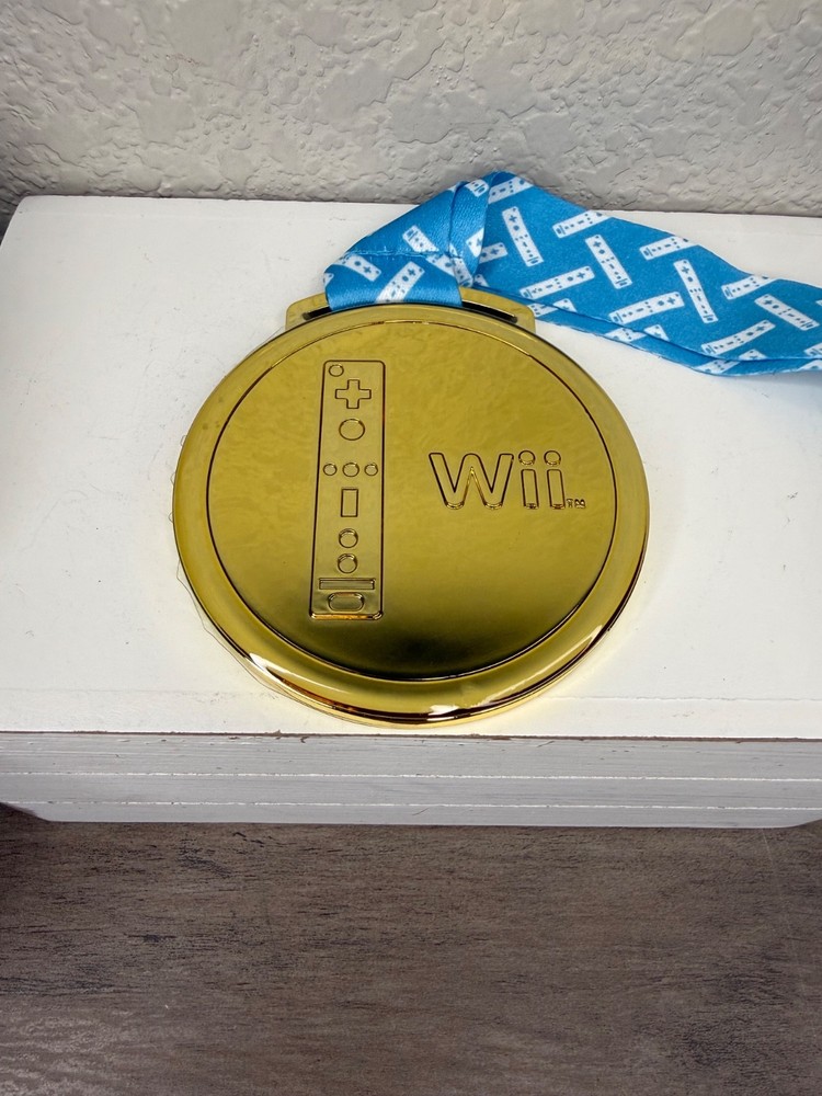 rare solid plastic gold colored WII award metal