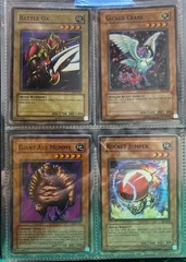 For sale is a Yu-gi-oh Trading Card Game card sleeve plus 9 extra cards