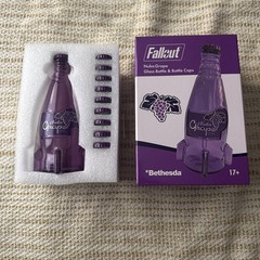Fallout Nuka Cola Grape Purple Glass Bottle + 10 Caps Tin Rocket Statue