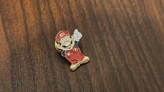 Vintage 1992 licensed Nintendo Super Mario Bros. pin standing