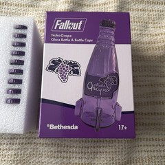 Fallout Nuka Cola Grape Purple Glass Bottle + 10 Caps Tin Rocket Statue