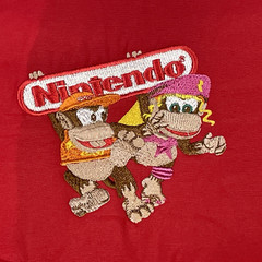 RARE!!! 90s Red Employee Coat SNES Nintendo Donkey Kong Diddy’s Quest Mens M N64