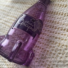 Fallout Nuka Cola Grape Purple Glass Bottle + 10 Caps Tin Rocket Statue